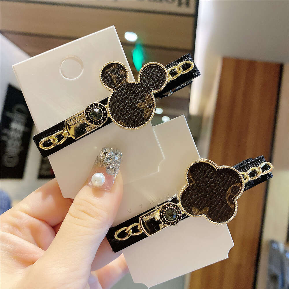 DHcollections Korean New Hair Cartoon Chain Metal Side Printed Leather Bangs Clip Kuaishou Same Style