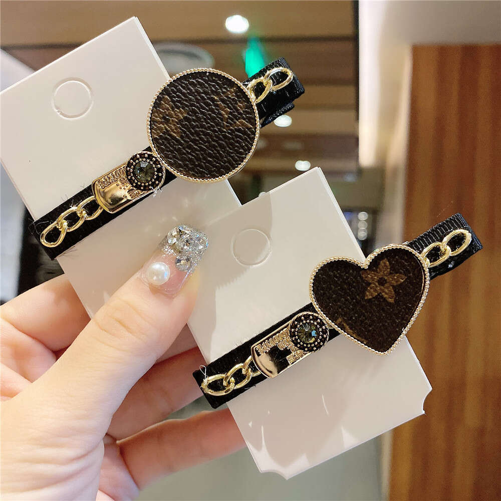 DHcollections Korean New Hair Cartoon Chain Metal Side Printed Leather Bangs Clip Kuaishou Same Style