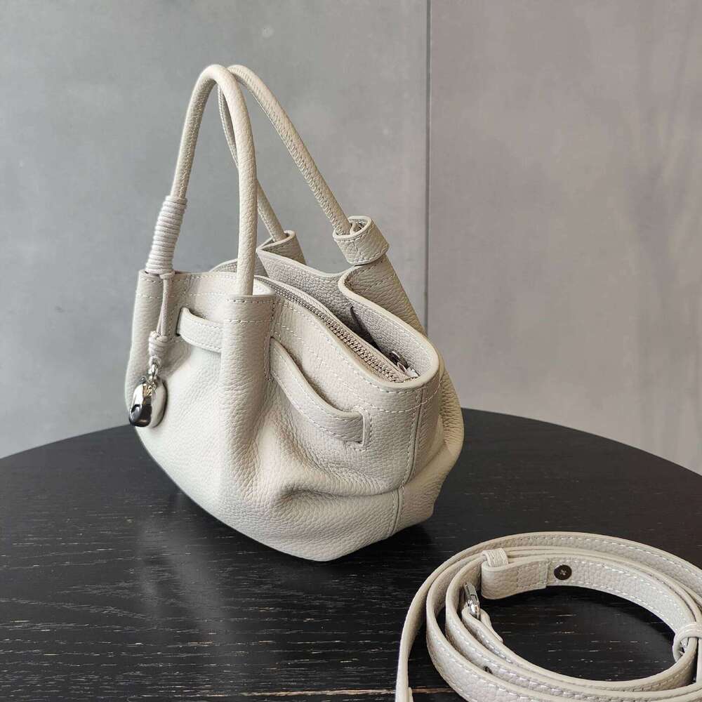 Luxury Designer bags 2025 Pink Blue Color Classic Look Catwalk Trapeze Tote with Metal Charm Natural Imported Cow Leather Women Handbag Shoulder Bag