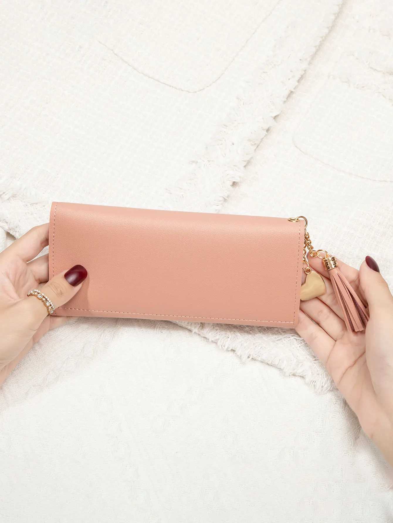 Simple and stylish three-fold womens wallet PU leather large capacity lg wallet tassel pendant solid color wallet card bagXJ250624