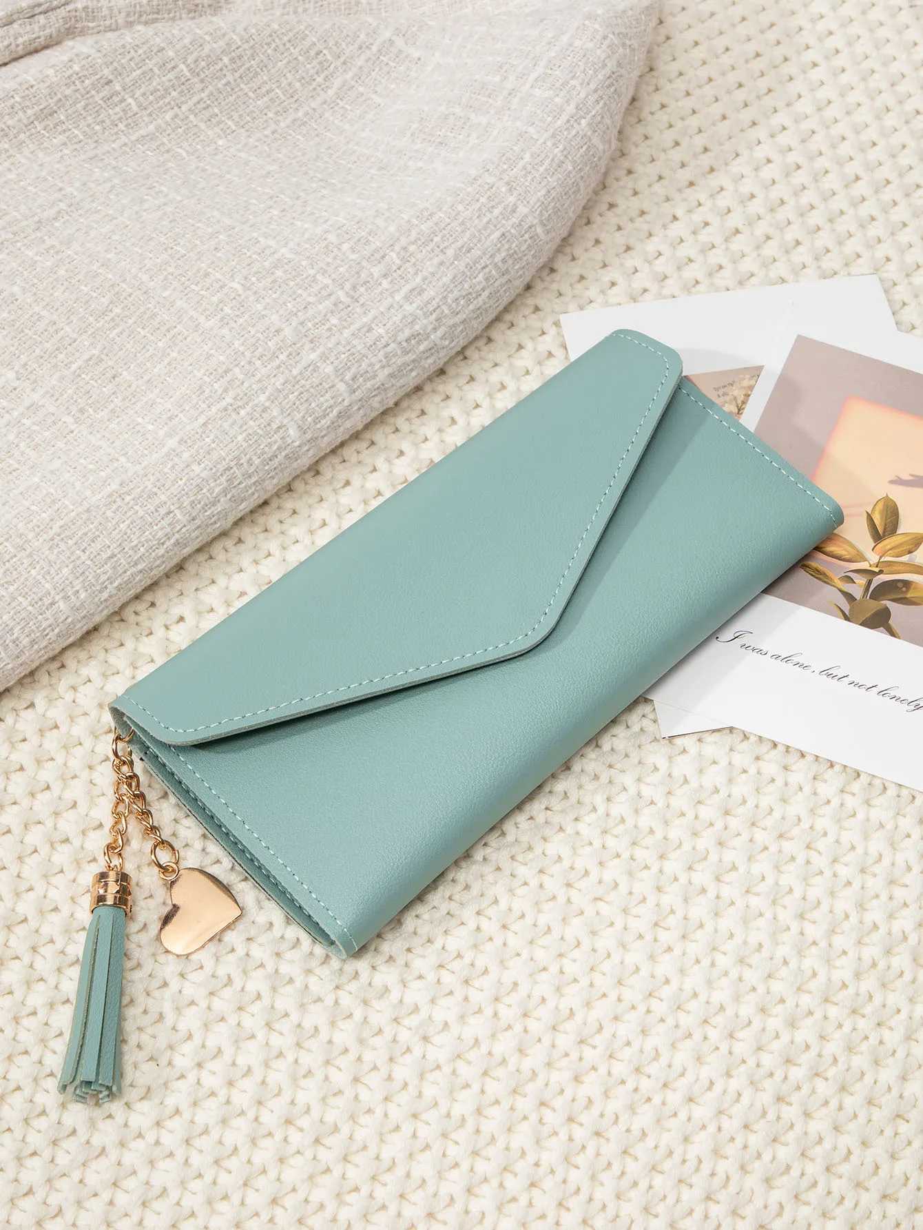 Simple and stylish three-fold womens wallet PU leather large capacity lg wallet tassel pendant solid color wallet card bagXJ250624