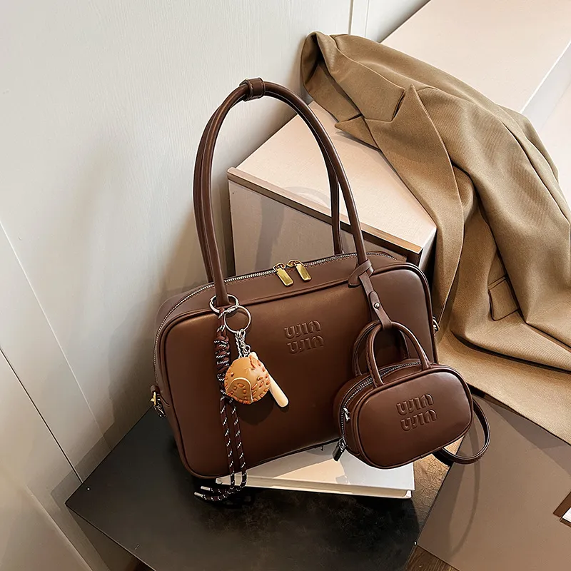 Free Shipping Retro large capacity bag for women autumnwinter work handbag pillow shoulder messenger