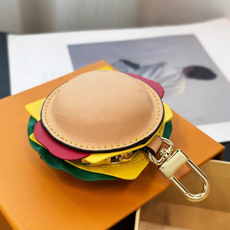Designer Keychain hamburger TM Cerise Cherry Blossom Bag Charm Chain Keychain Lanyards Wallet Accessries Fashion Men Women Earphone bag Charms Leather Pendant