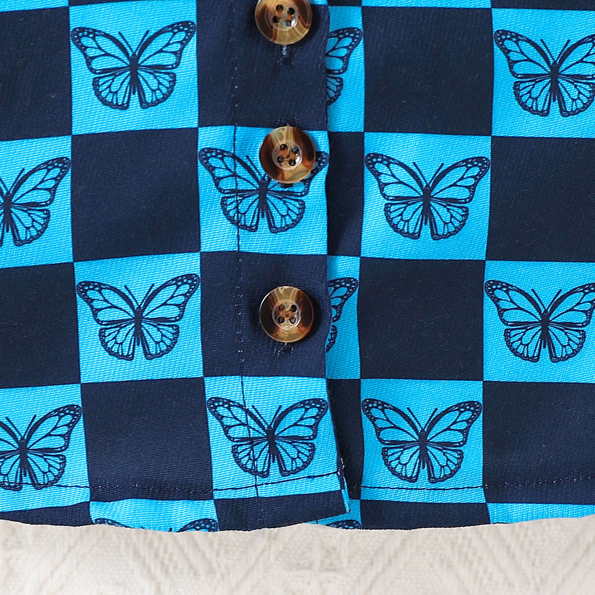 2-piece set of fashionable and casual solid color flying sleeve round neck long sleeved triangle jumpsuit and butterfly printed short skirt for baby g