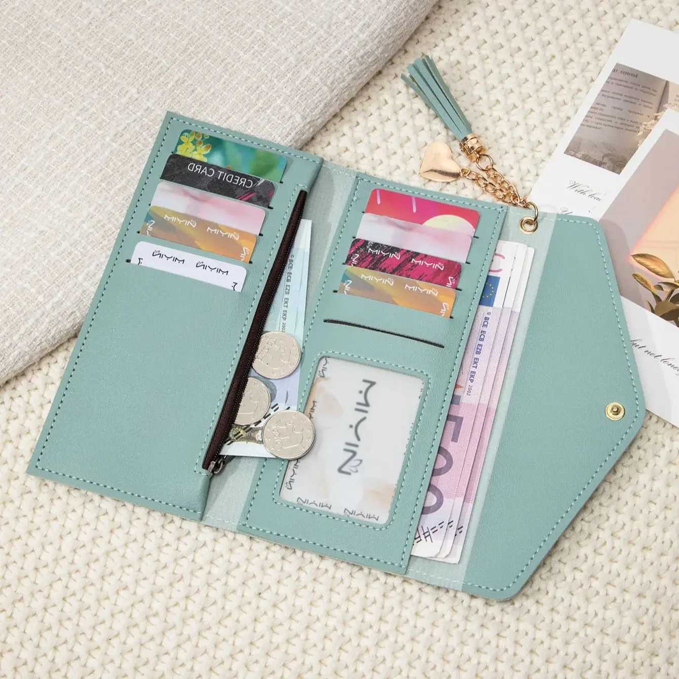 Simple and stylish three-fold womens wallet PU leather large capacity lg wallet tassel pendant solid color wallet card bagXJ250624