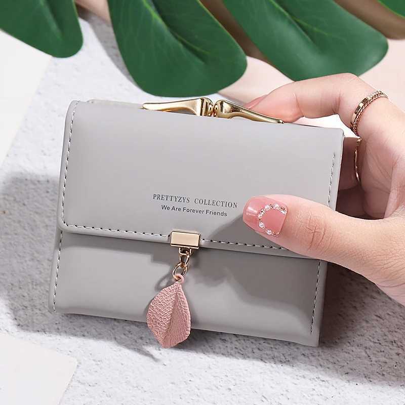 2024 Summer Explosive Style Womens Short Wallet Korean PU Leather Simple Everything with Solid Color Personality Leaf PendantXJ250624
