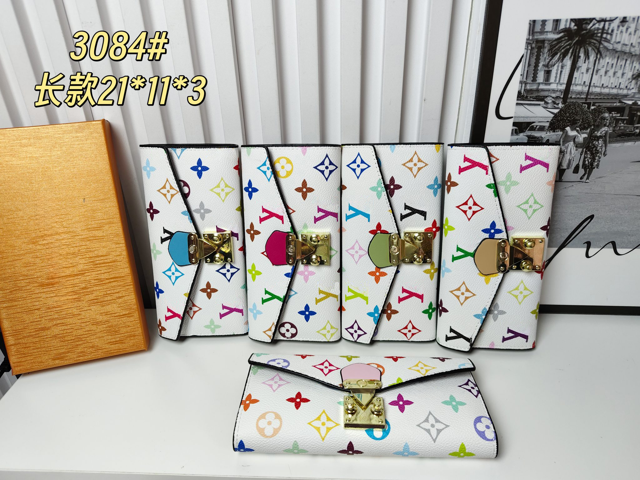 Stylish Patterned Clutch Wallets catching colorful prints and metal clasps these clutch - style wallets have multiple slots Ideal for carrying cards and small items