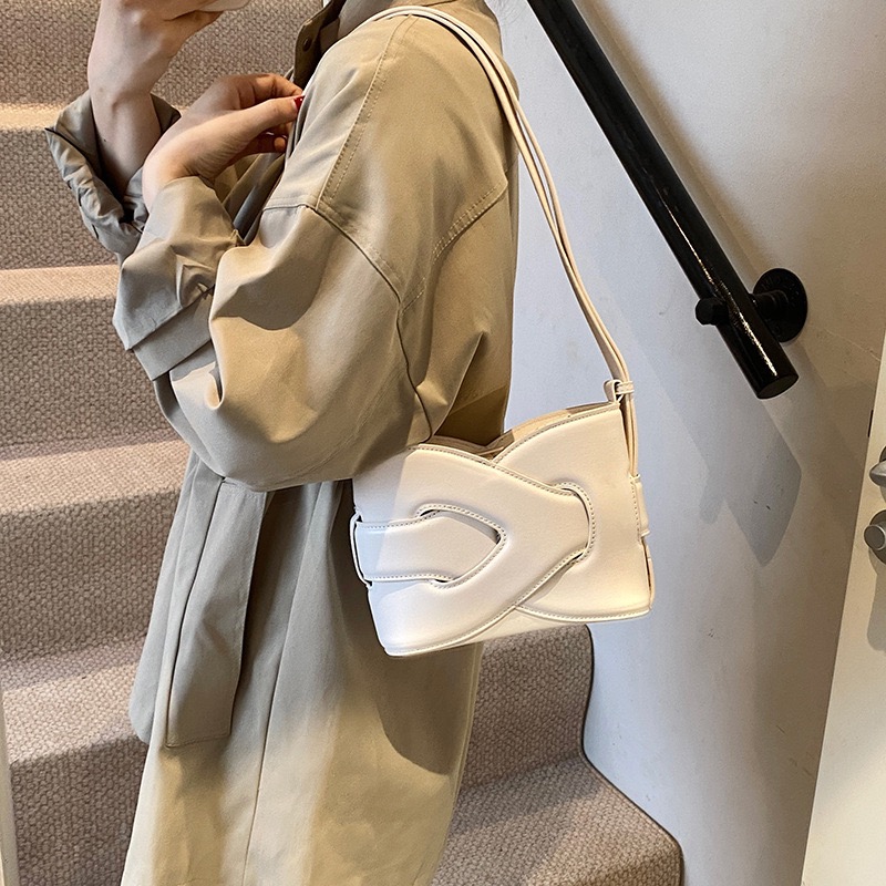 New geometric leather hot item classic symmetrical design single shoulder diagonal cross shaped handbag