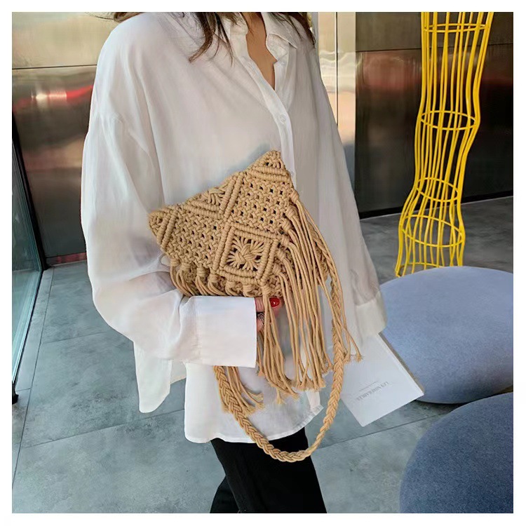 2025 Cotton thread crossbody straw woven bag ethnic style handmade woven bag hollow-out tassel fresh and Korean-style small bag