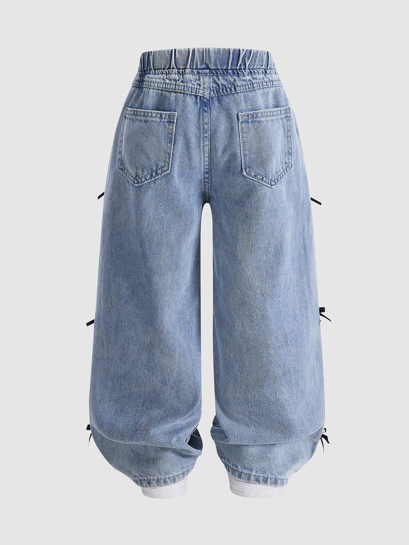 Cute Kid's Lightweight Indigo Trousers Complemented by an Elegant Black Knot Embellishment
