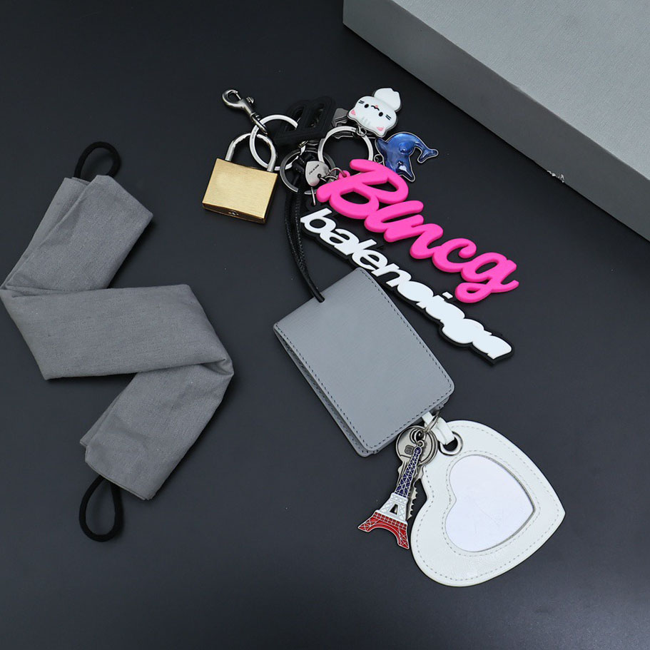 2025 New Rodeo Charm Metal Lock Chain Letter Keychain Handbag Backpack Handheld Crossbody Bag Car Key Product Fashion Decoration Accessories Rodeo Bag 43563w