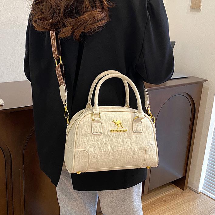 Free shipping new designer bag Shoulder Bags For woman Textured bowling bag crossbody bag minimalist and versatile Boston bag handbag