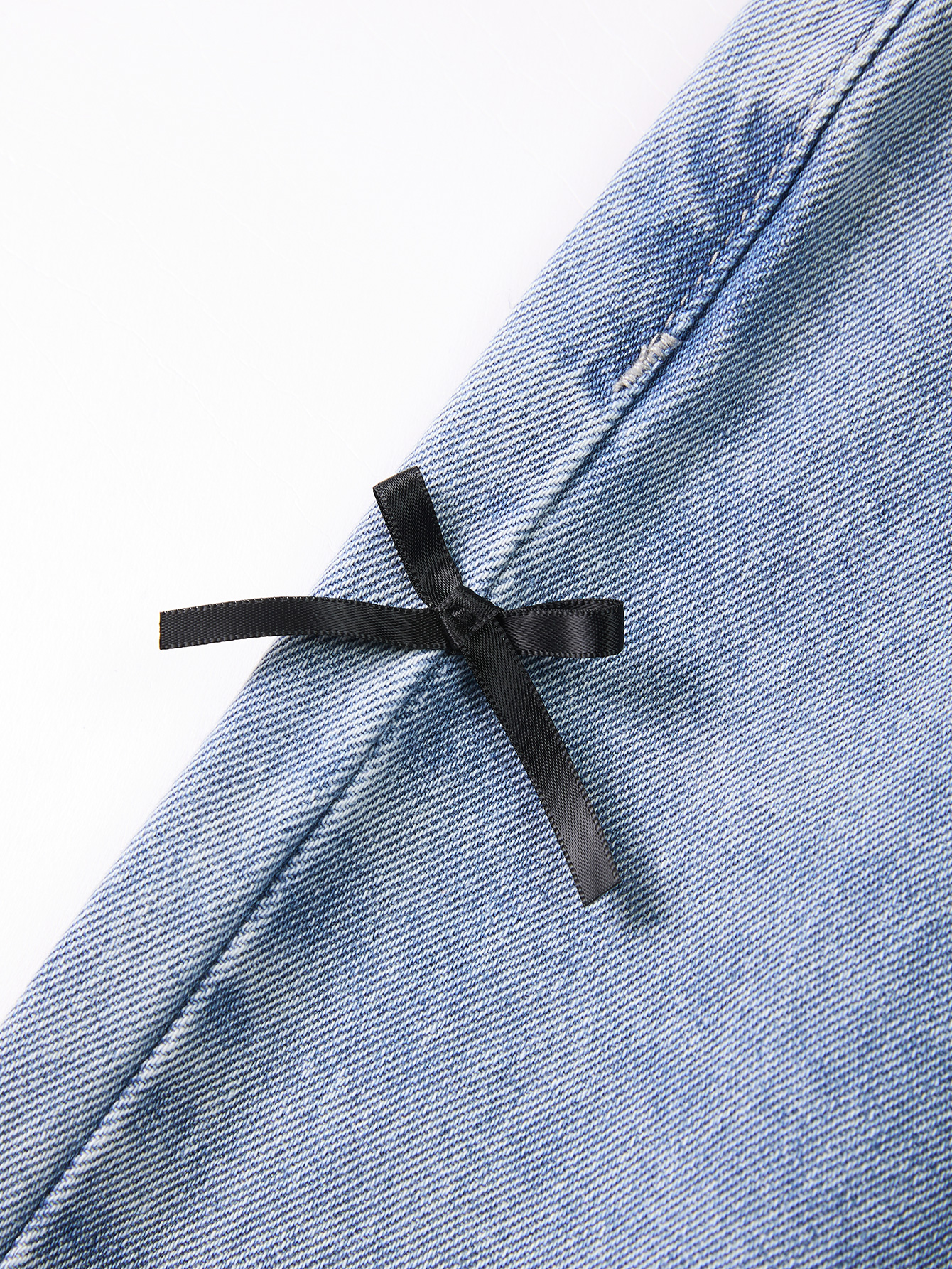 Cute Kid's Lightweight Indigo Trousers Complemented by an Elegant Black Knot Embellishment
