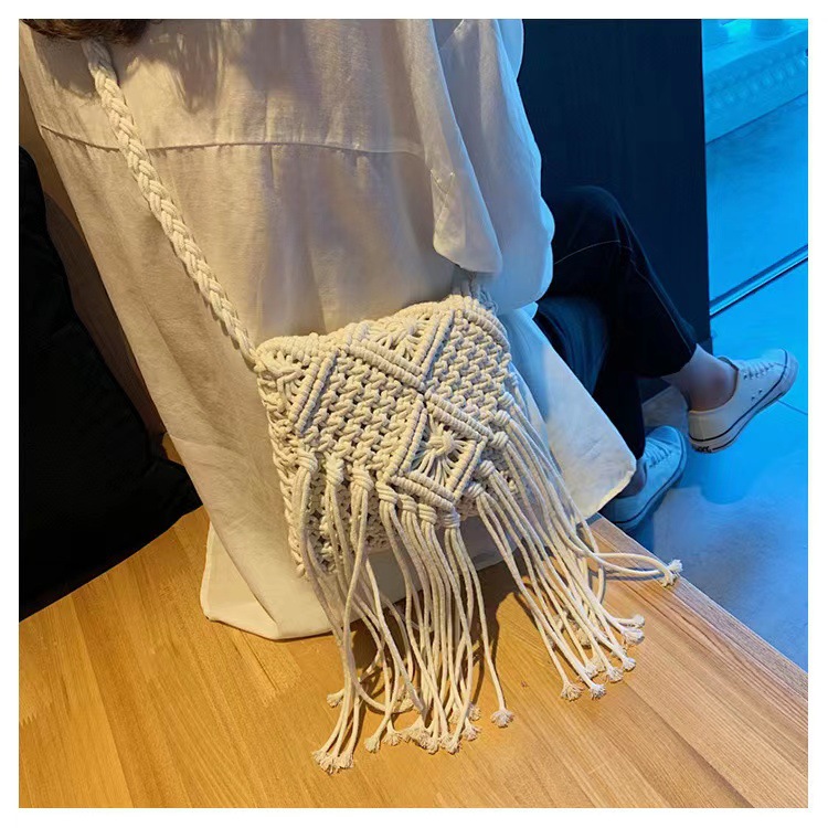 2025 Cotton thread crossbody straw woven bag ethnic style handmade woven bag hollow-out tassel fresh and Korean-style small bag