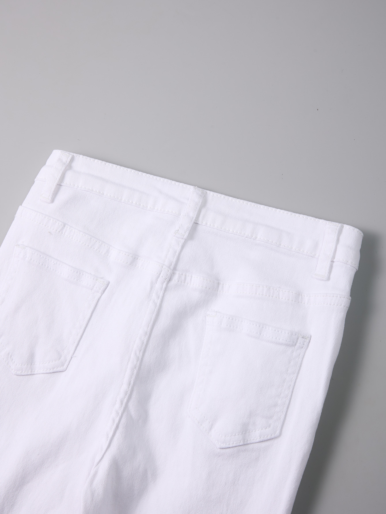 Children's White Denim Tight Pants with Black Devil Face Pattern for Halloween