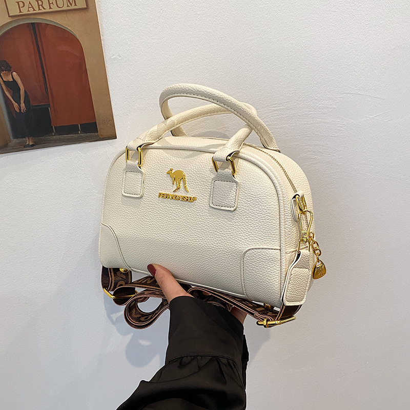 Free shipping new designer bag Shoulder Bags For woman Textured bowling bag crossbody bag minimalist and versatile Boston bag handbag