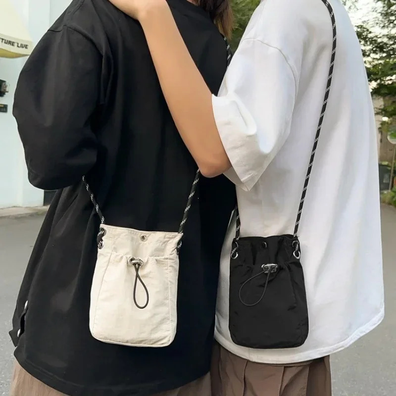 Korean Mini Nylon Shoulder Bag for Men Women Chic Crossbody Bucket Bag Casual Small Handbag Drawstring Buckle Purse Phone Pouch 250624