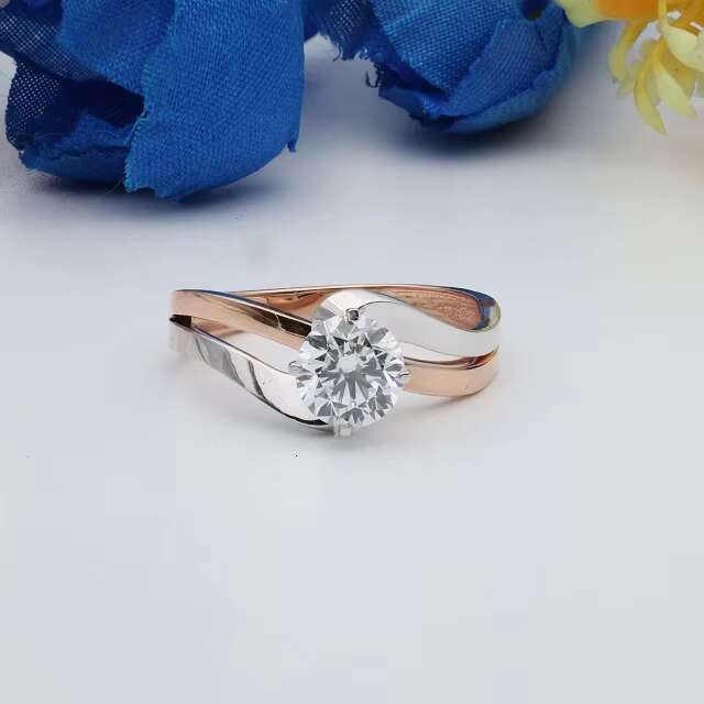 Sophisticated Unisex Designer Gemstone Jewelry Piece Featuring a Versatile Oval-Shaped Stone Embedded in Robust Yellowish-Pink Alloy