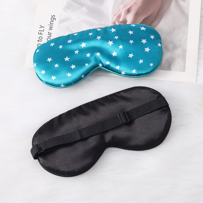 Eye mask in stock - silk sleep mask with blackout printing and five-pointed stars. Perfect for naps, travels, home use. Adjustable tightness.