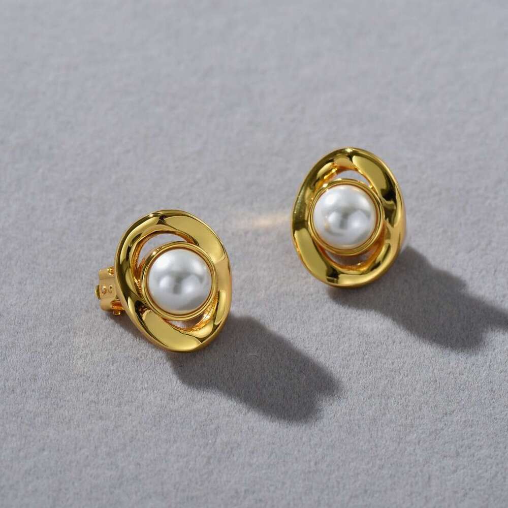 DHCollections Spring and Autumn New High-end Metal Brass Gold-plated Irregular Hollow Inlaid Pearl Earrings Simple Ear Clips