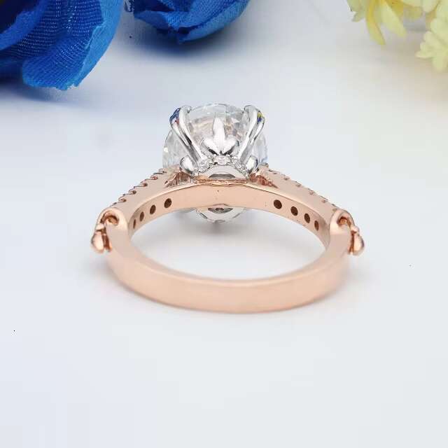 Elegant Round Cut Paved Diamonds Solitaire Bridal Ring Featuring a Subtle Halo