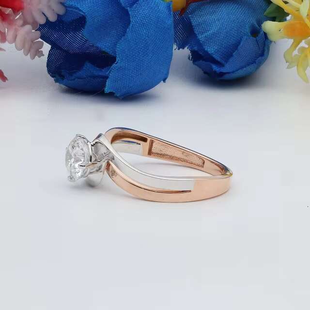 Sophisticated Unisex Designer Gemstone Jewelry Piece Featuring a Versatile Oval-Shaped Stone Embedded in Robust Yellowish-Pink Alloy