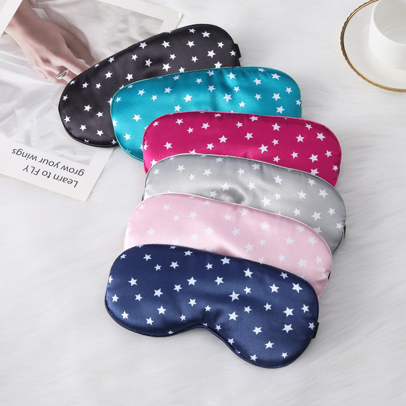 Eye mask in stock - silk sleep mask with blackout printing and five-pointed stars. Perfect for naps, travels, home use. Adjustable tightness.