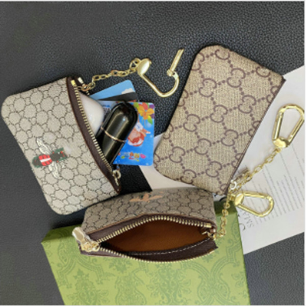 Designers luxurys Purses KEY POUCH POCHETTE CLES Women Mens Key Ring Credit Card Holder Coin Purses Mini Wallet Bag and dustbag 10a card holders designer