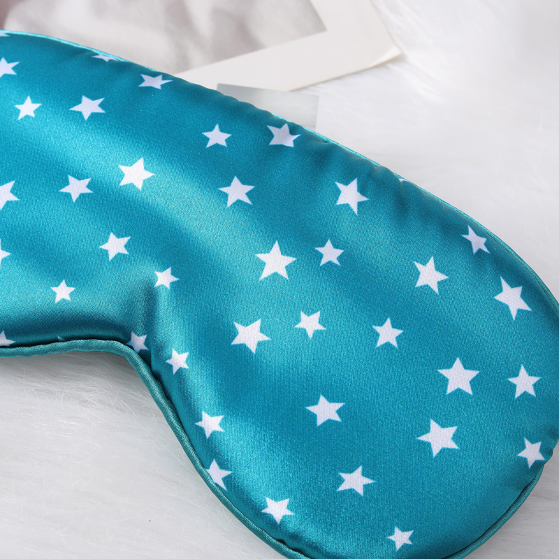 Eye mask in stock - silk sleep mask with blackout printing and five-pointed stars. Perfect for naps, travels, home use. Adjustable tightness.