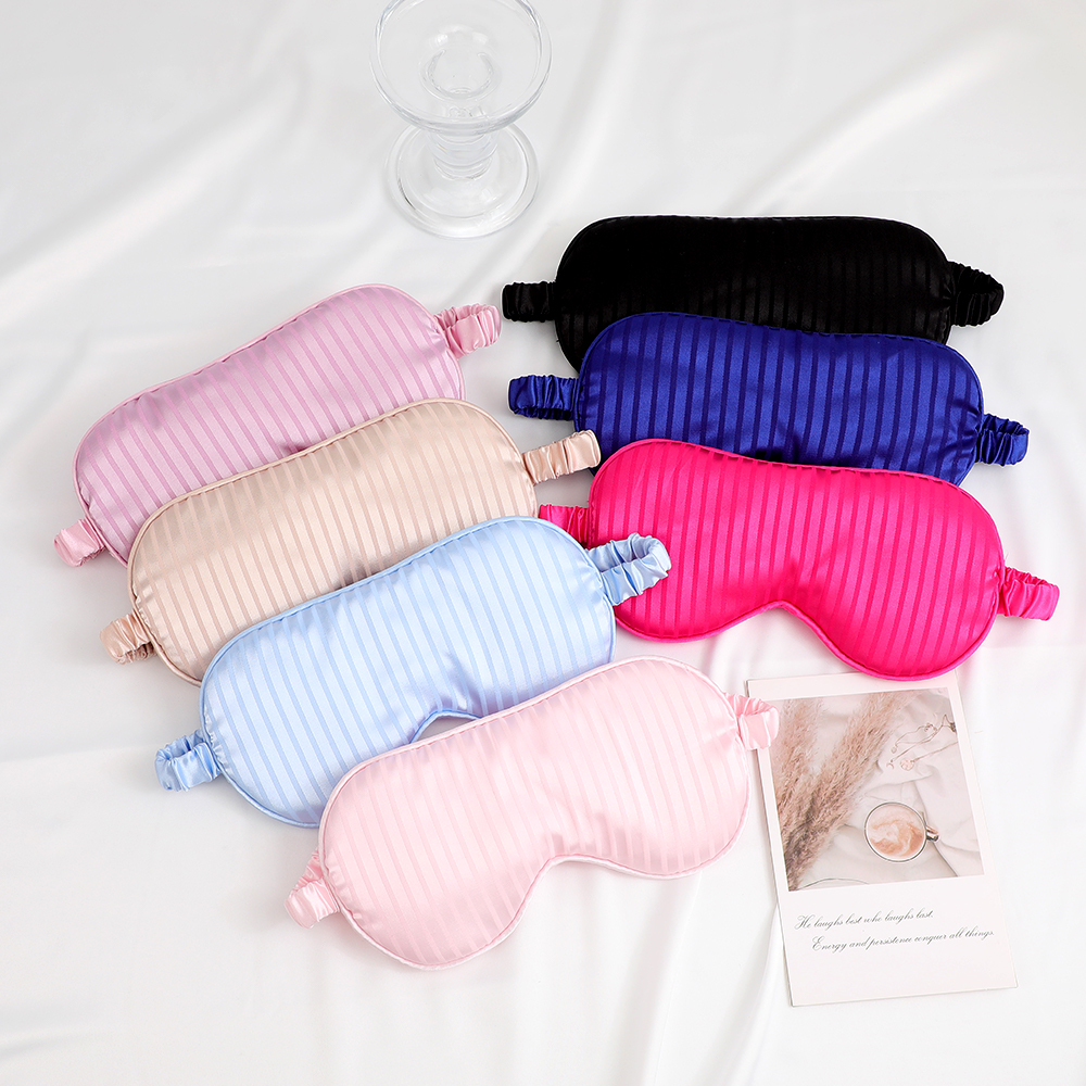 New silk-like striped pattern eye mask for light-blocking sleep - with logo printed on it. Essential for outdoor travel. In stock.