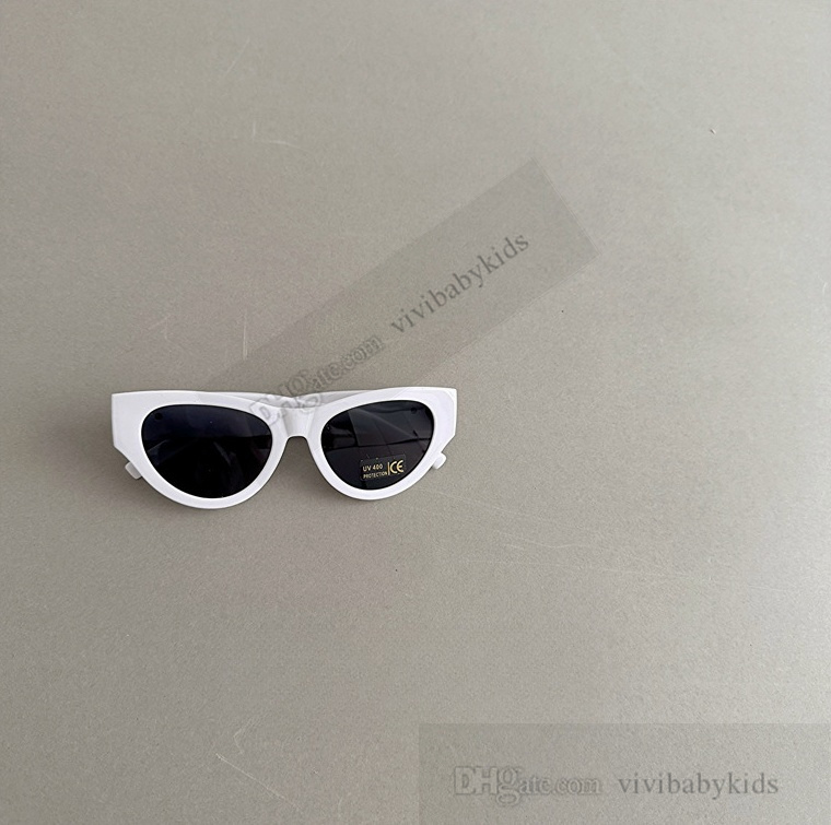 Lady style Kids cat eye INS girls leopard metal letter sunglasses summer children Uv 400 goggles beach sunblock shade S4237 Z260305