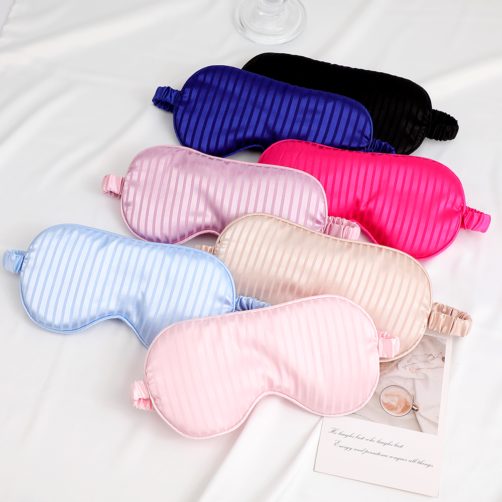New silk-like striped pattern eye mask for light-blocking sleep - with logo printed on it. Essential for outdoor travel. In stock.