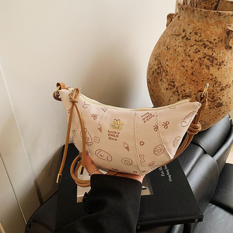 2025 new free shipping designer Single shoulder Pillow bag Vintage solid color casual versatile Tote package fashionable women pink white