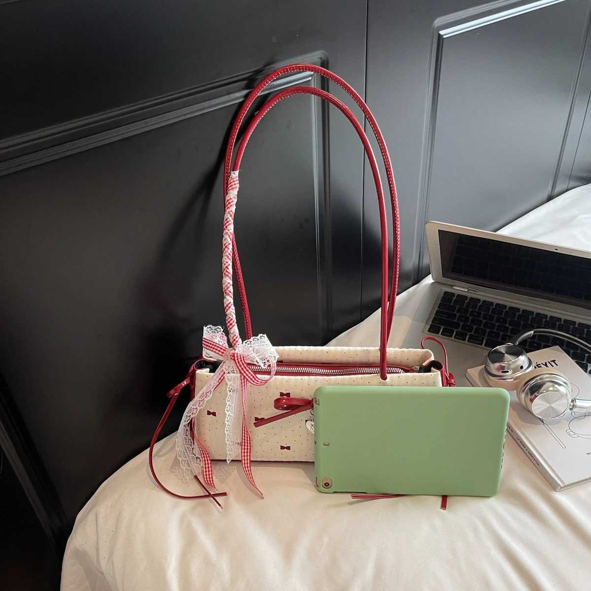 Mini ladies handbags handbag from China. Minority design shoulder bag new commuter temperament bow advanced texture shoulder bag. XJ250627