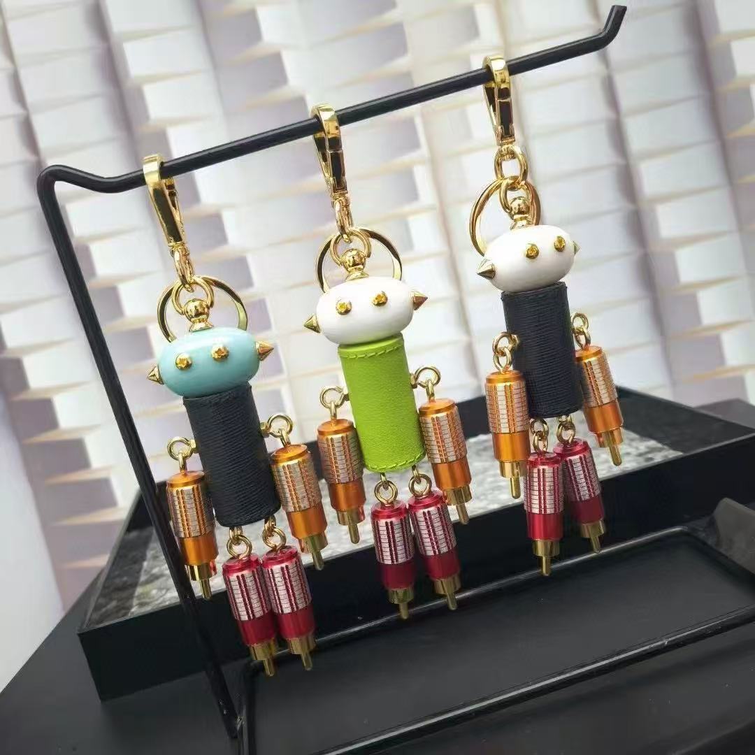 Designer Robot Saffiano leather bag charm luxury keychain triangle Personalized metal robot pendant handbag charm for women men Accessories Key Chain