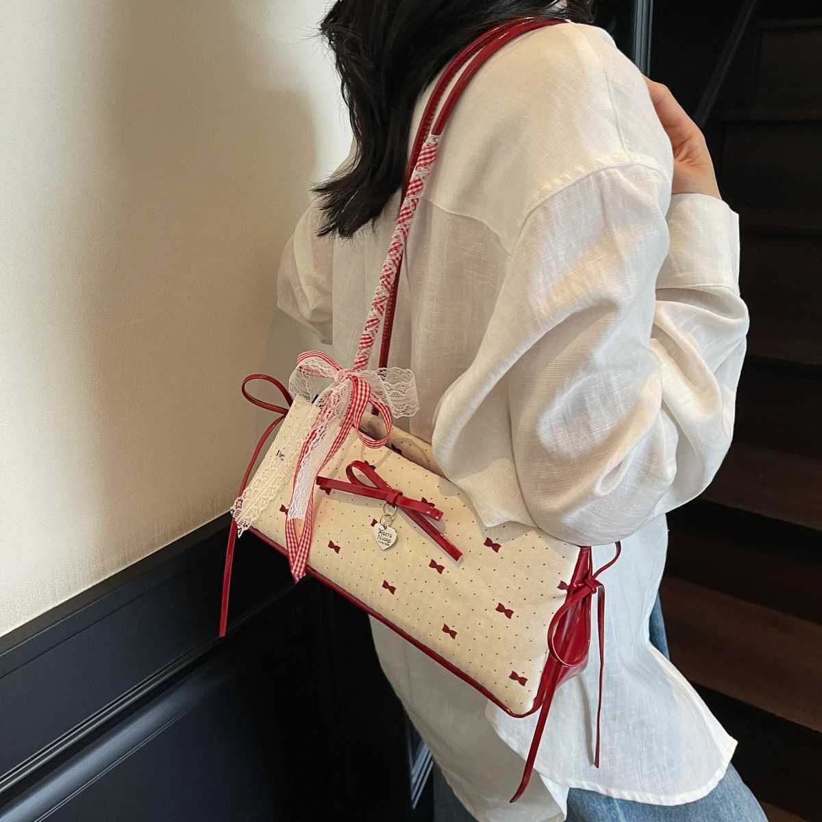 Mini ladies handbags handbag from China. Minority design shoulder bag new commuter temperament bow advanced texture shoulder bag. XJ250627