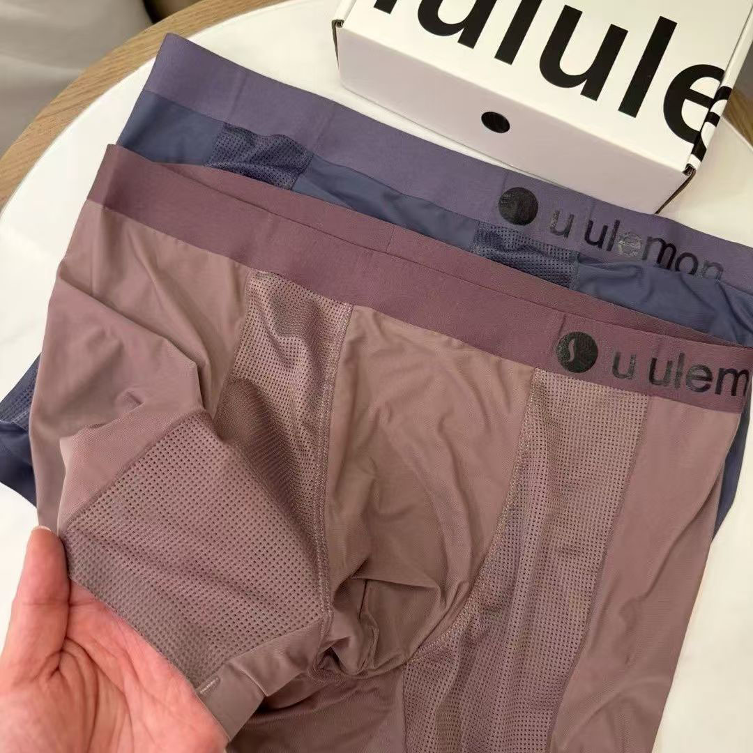 Luxury fashion designer sexy breathable quick-drying men's beach boxers retro casual shorts.