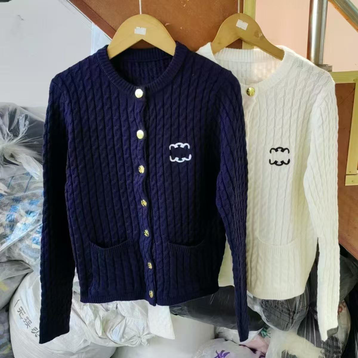 Fall/winter hemp pattern sweater women's knitted cardigan new long-sleeved embroidered bubble sleeve jacket with wild short coat.