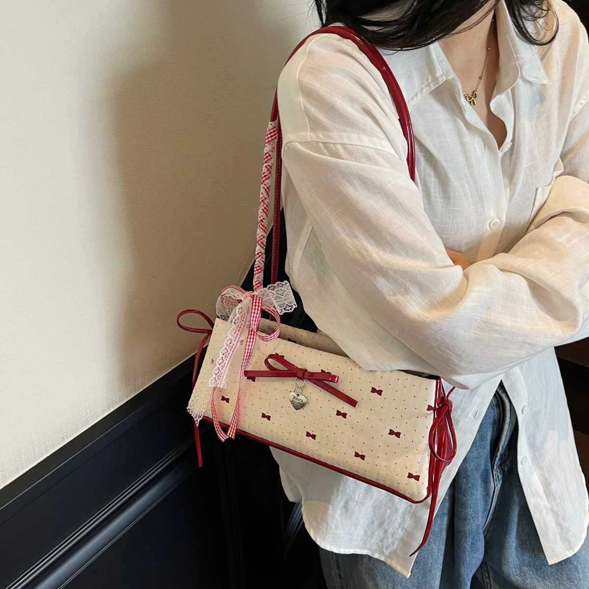 Mini ladies handbags handbag from China. Minority design shoulder bag new commuter temperament bow advanced texture shoulder bag. XJ250627