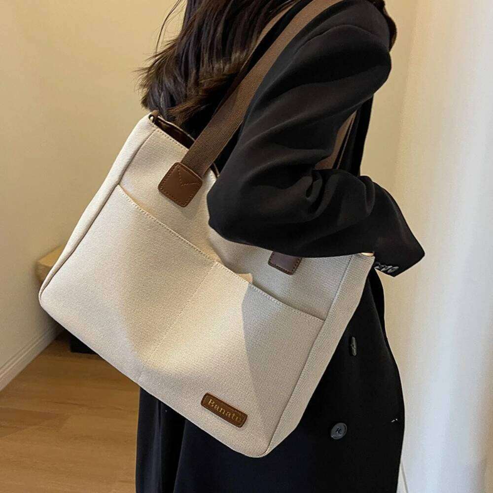 New trend canvas large-capacity fashion wild shoulder bag senior texture classroom commuting Tote bags