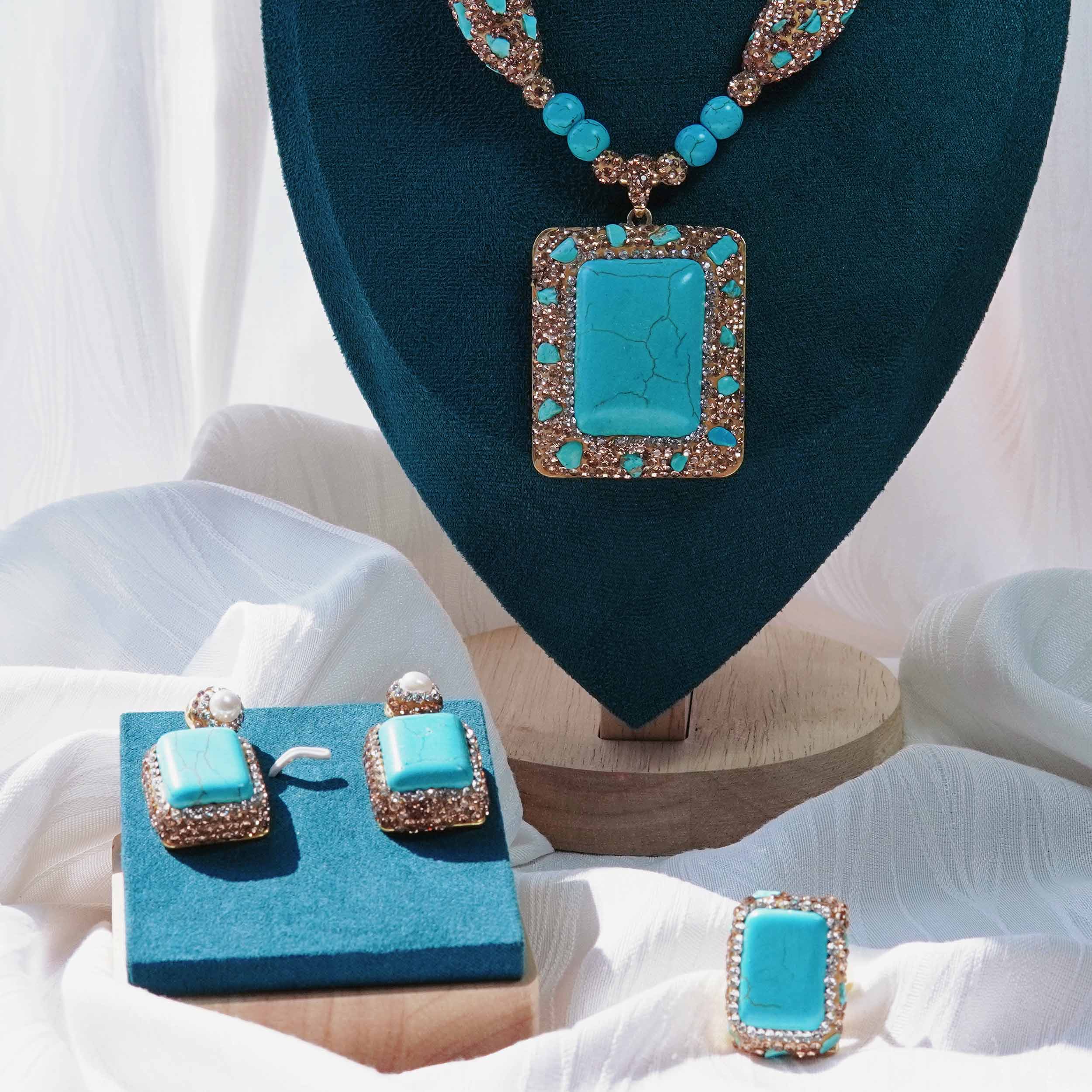 Lingyun is a Tibetan square turquoise energy jewelry set with light and luxurious design. Turquoise ring earrings necklace earrings necklace