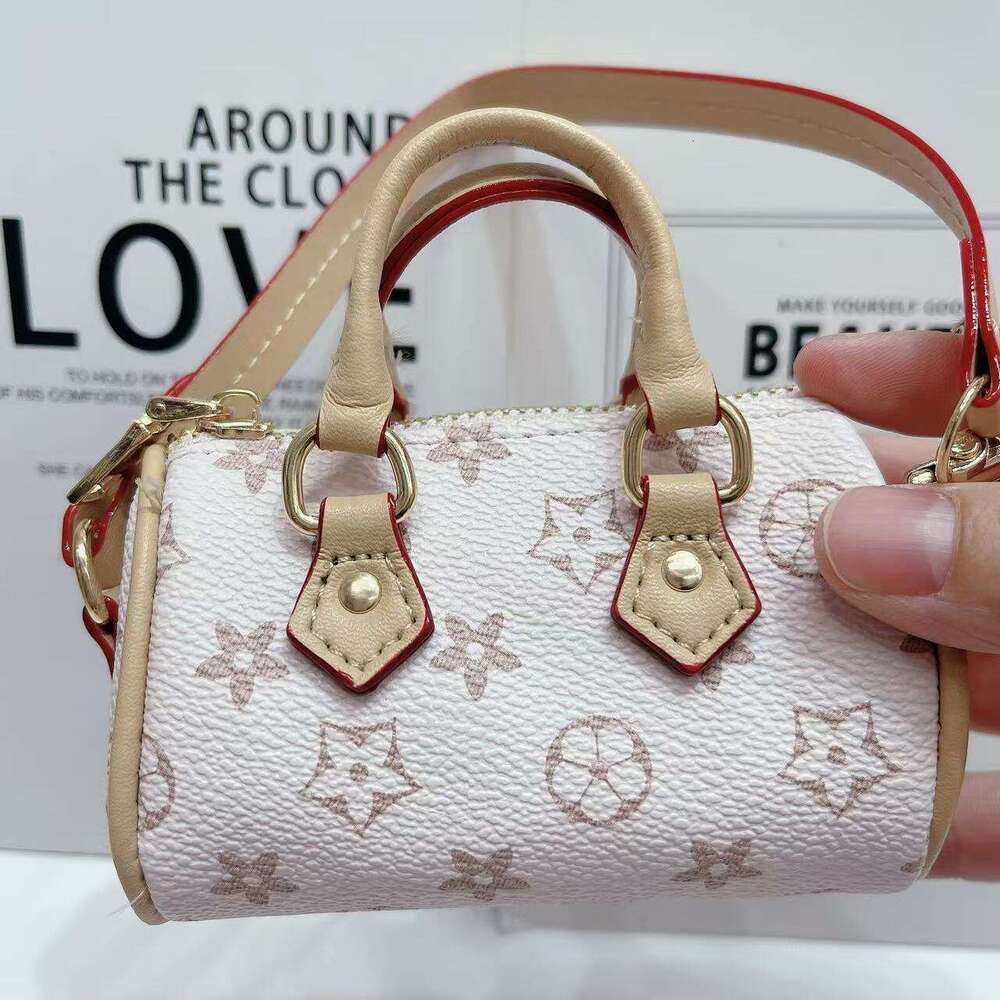 Best Seller Coin Purse Lipstick Flower Shell Creative Trendy Earphone Keychain Fashion Pendant Mini Bag