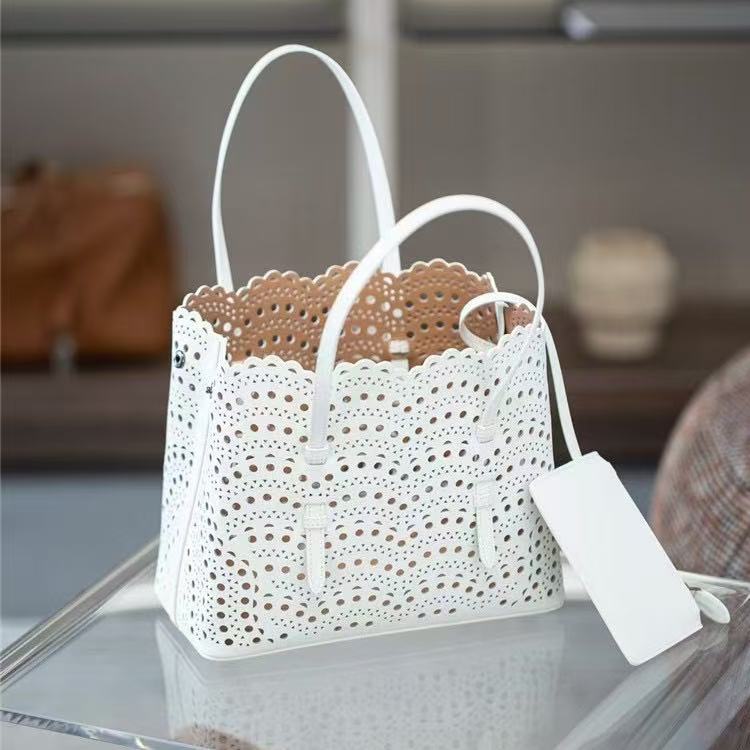 Advanced hollowed out carved cowhide vegetable basket, single shoulder crossbody bag, small bag, tote bag Top Designer bag Hand Bag Fashion Flap Fashi