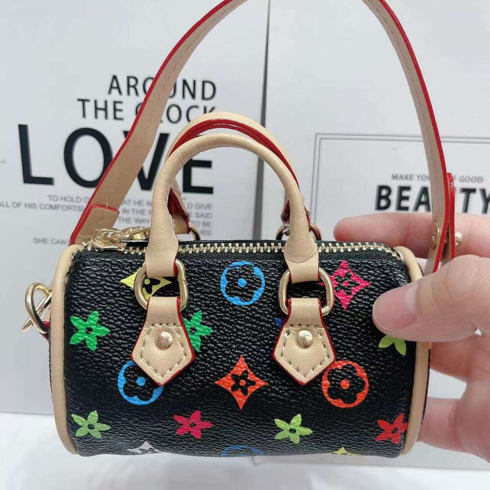 Best Seller Coin Purse Lipstick Flower Shell Creative Trendy Earphone Keychain Fashion Pendant Mini Bag