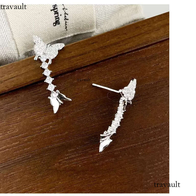 DHcollection Bright Earrings Made of Pure Sier Double Butterfly Cube Zircon for Women