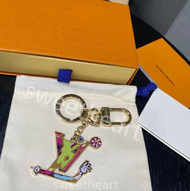 Paris Designer keychains 20 style Brand keyring Fashion metal Leather key chain Charm fashion bags Pendant Handbags Car Keys Accessories Best Christmas Gift