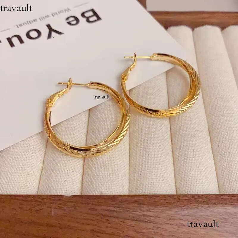 DHCollections Ins Fashion Double Twist Earrings Simple Copper Gold-Plated S Sier Waterproof Brass Trendy Wholesale Socialite Temperament