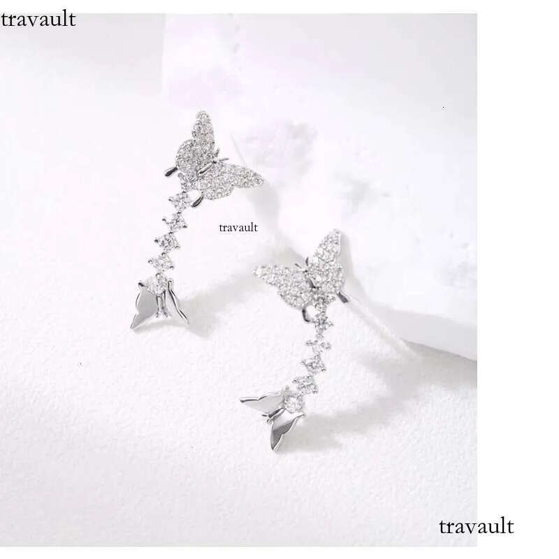 DHcollection Bright Earrings Made of Pure Sier Double Butterfly Cube Zircon for Women