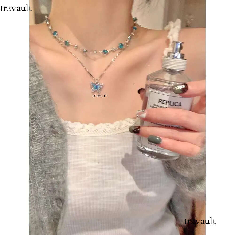DHCollections Double Layer Wear Blue butterfly Zircon Necklace Light High Sense Clavicle Chain Fashion Design Niche Accessories