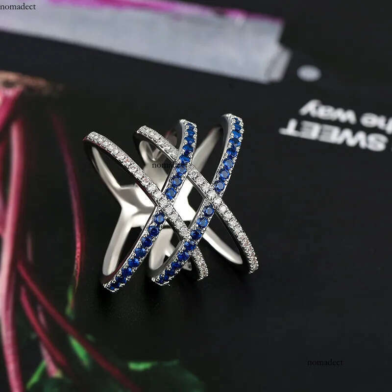 2024 Drop Ship Ins Wedding Rings Jewelry Sterling Sier Bue Sapphire CZ Dia Gemstones Party Eternity Women Engagement Cross Ring For Lover Gift ce